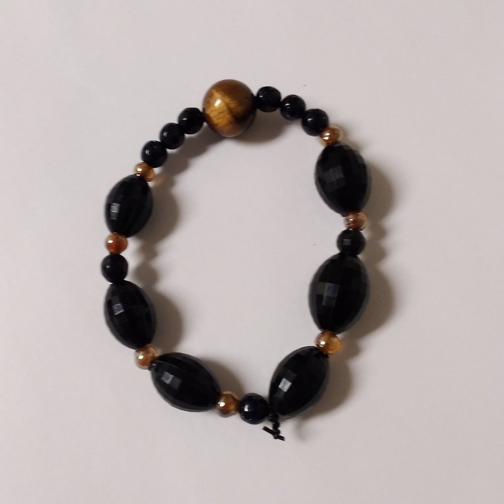 Black, gold and and brown tan ball homemade bracelet🖤💛